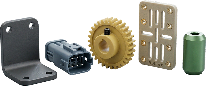 3D printed industrial parts including brackets, gears, and connectors